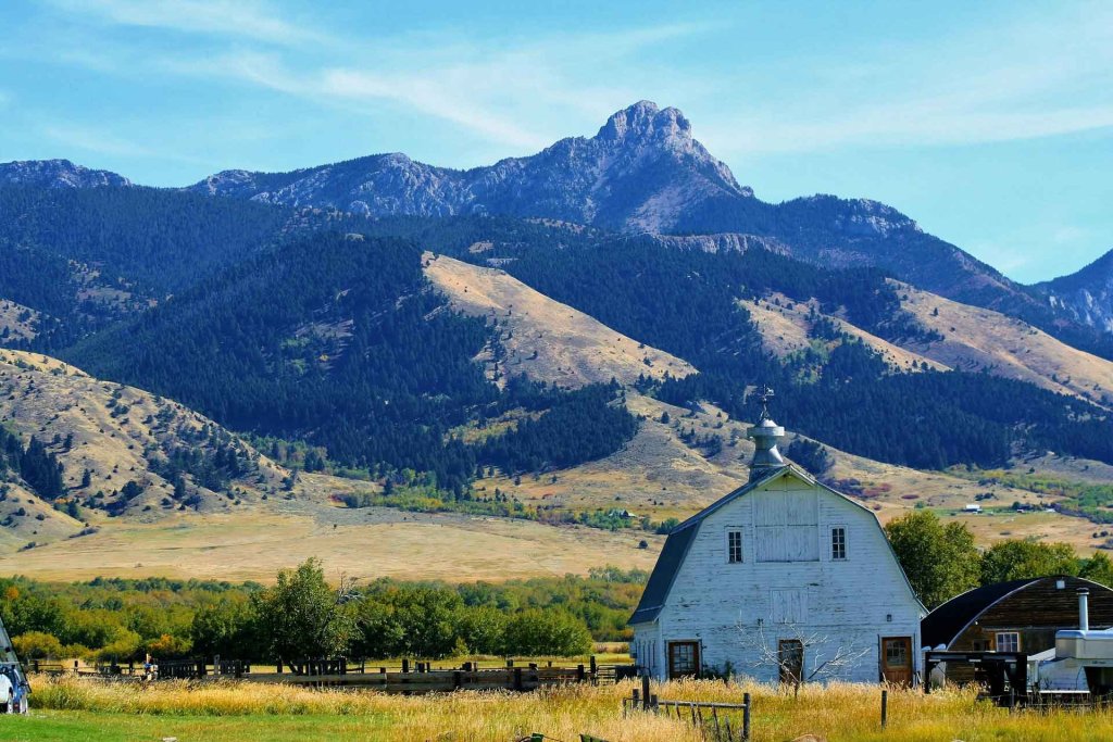 Bitterroot Valley Yellowstone Barn with Mountains in the background Montana