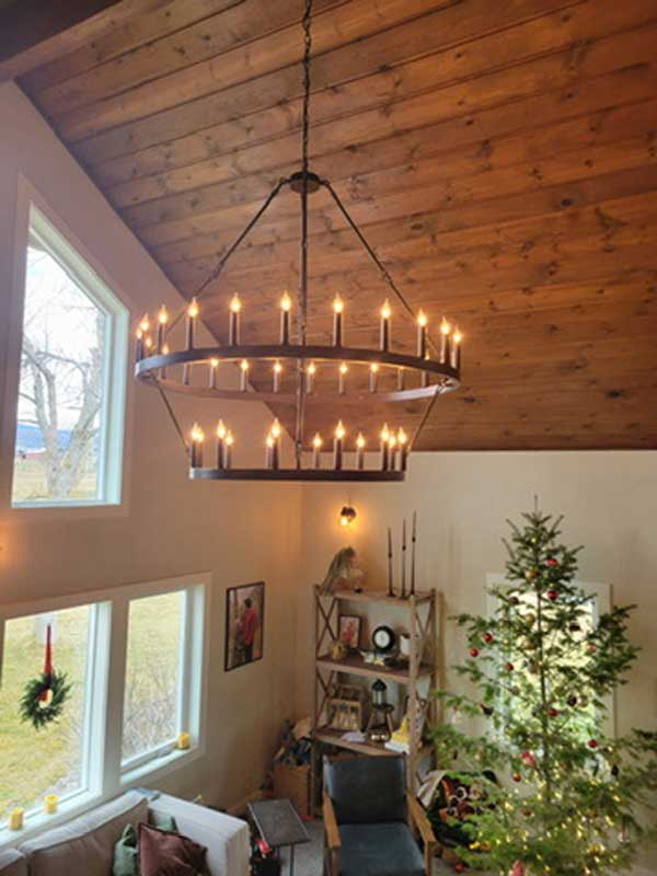 Missoula electrician installs Luxury home interior lighting Chandelier in grand room
