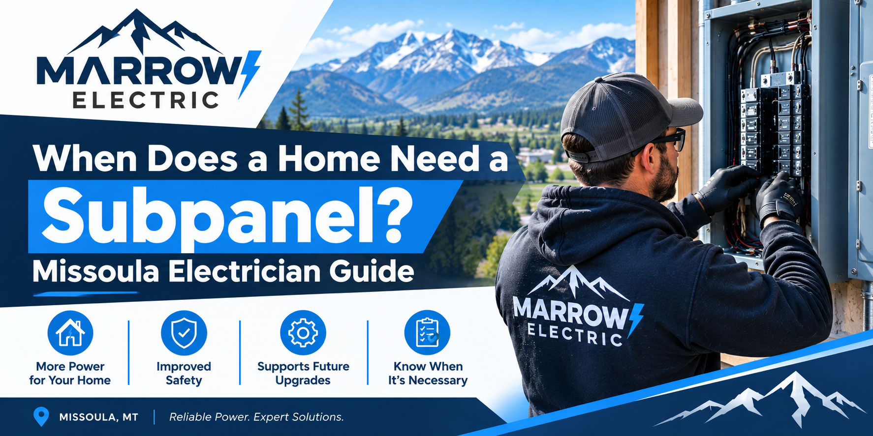 Missoula electrician installing a new subpanel next to a main breaker panel in a Montana home garage